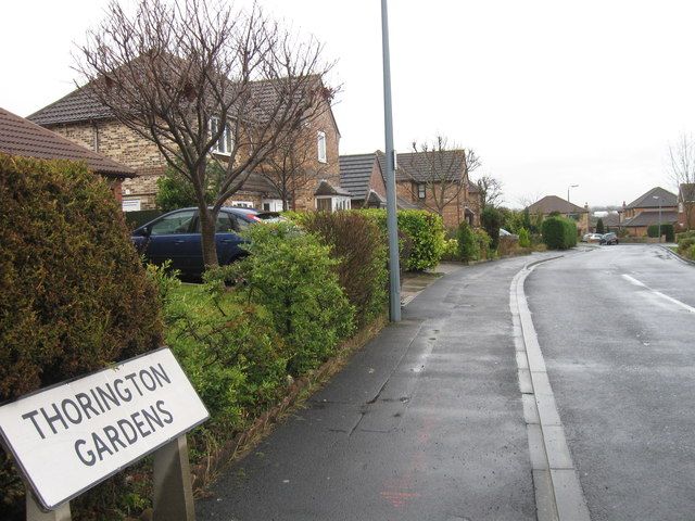 Thorington Gardens street sign and modern houses in Ingleby Barwick